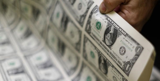 Merkez Bankası faizi 1 puan daha düşürdü, dolar rekor tazeledi